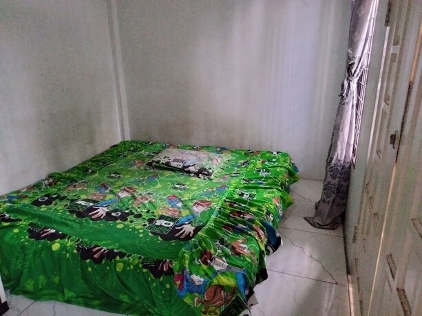 Imagen de la habitación del Hotel SPOT ON 92749 As-sakinah Syariah 2. Foto 18