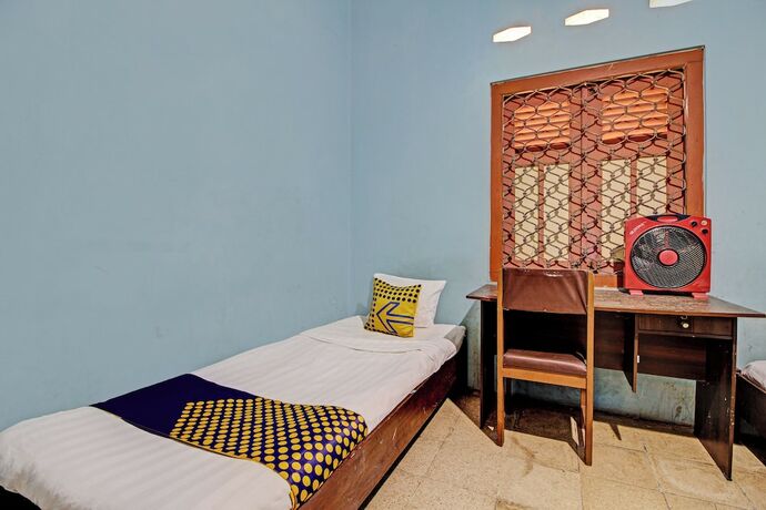Imagen de la habitación del Hotel SPOT ON 92763 Melati Sukoasih. Foto 18