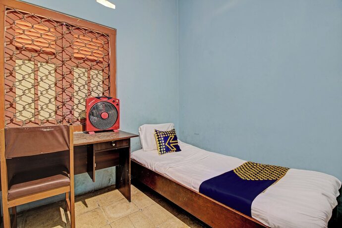 Imagen de la habitación del Hotel SPOT ON 92763 Melati Sukoasih. Foto 19