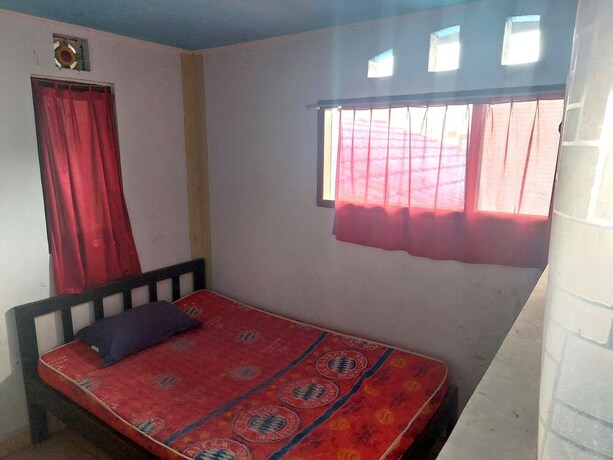Imagen de la habitación del Hotel SPOT ON 92776 Panorama House. Foto 20