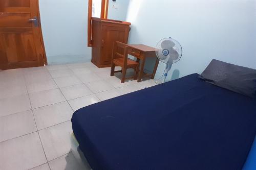 Imagen de la habitación del Hotel SPOT ON 92814 Gioba Kost Syariah. Foto 19