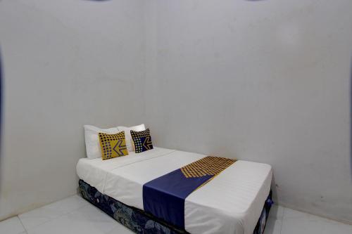 Imagen de la habitación del Hotel SPOT ON 92828 Galih Kost 1 Syariah. Foto 20