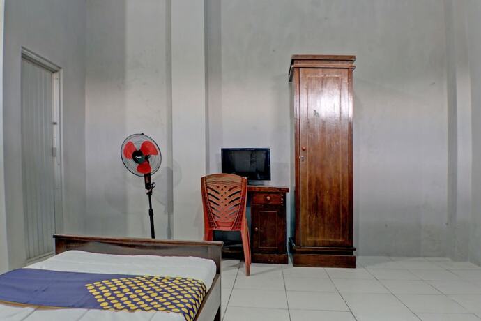 Imagen de la habitación del Hotel SPOT ON 92834 Wisma Dira Tiara Syariah, Bandar Lampung. Foto 20