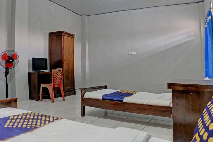 Imagen de la habitación del Hotel SPOT ON 92834 Wisma Dira Tiara Syariah. Foto 19