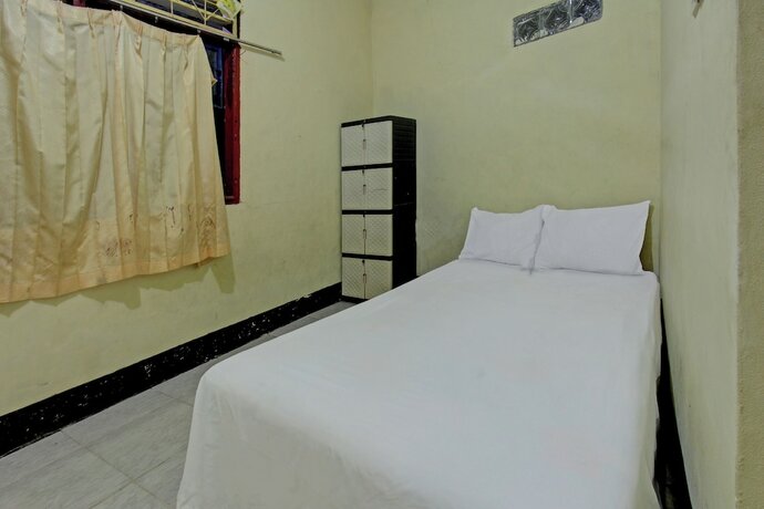 Imagen de la habitación del Hotel SPOT ON 92882 Penginapan 3 Bersaudara. Foto 20
