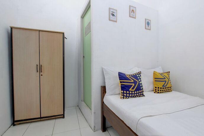 Imagen de la habitación del Hotel SPOT ON 92886 Pondok Kopi Homestay Syariah. Foto 17