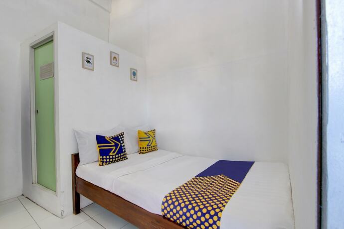 Imagen de la habitación del Hotel SPOT ON 92886 Pondok Kopi Homestay Syariah. Foto 18