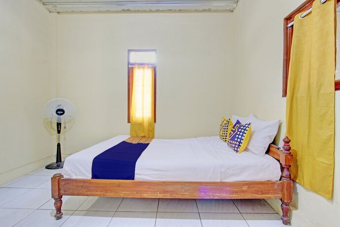 Imagen de la habitación del Hotel SPOT ON 92930 Syifa Guest House Syariah. Foto 19