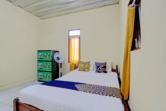 Imagen de la habitación del Hotel SPOT ON 92930 Syifa Guest House Syariah. Foto 20