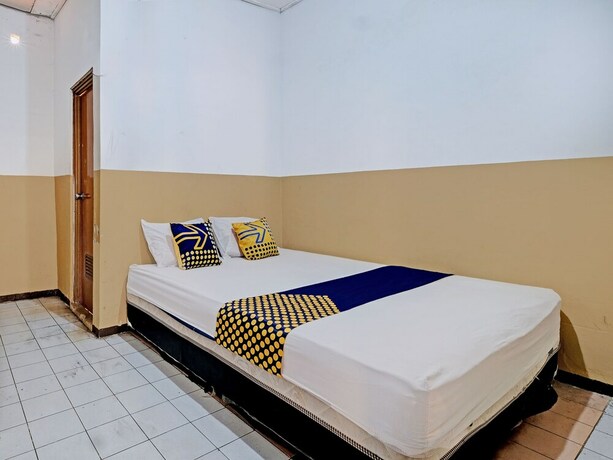 Imagen de la habitación del Hotel SPOT ON 92983 Ayu. Foto 20