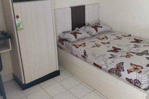 Imagen de la habitación del Hotel SPOT ON 93005 Berkah Kedawung. Foto 18