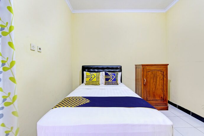 Imagen de la habitación del Hotel SPOT ON 93007 Guest House Lestari. Foto 20