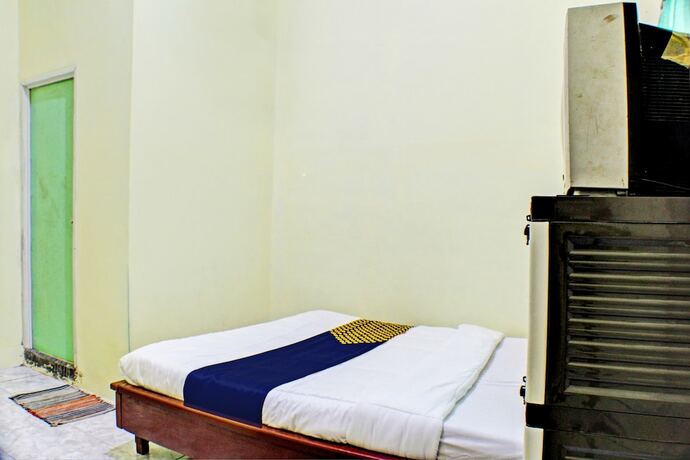 Imagen de la habitación del Hotel SPOT ON 93089 Homestay Kamar Hijau Syariah. Foto 19