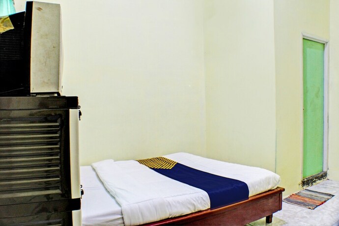 Imagen de la habitación del Hotel SPOT ON 93089 Homestay Kamar Hijau Syariah. Foto 20