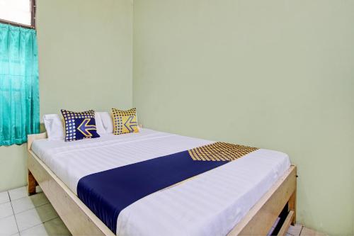 Imagen de la habitación del Hotel SPOT ON 93182 Jaya Kusuma. Foto 20