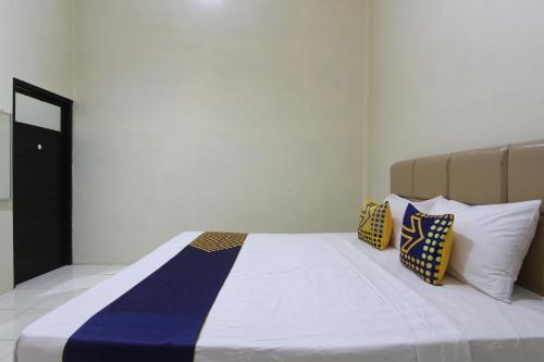 Imagen general del Hotel SPOT ON 93245 Guest House Mulia Syariah. Foto 16