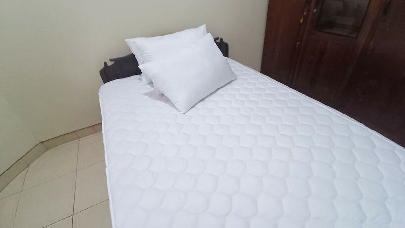 Imagen de la habitación del Hotel SPOT ON 93376 Roemah Ambarrukma 185 Syariah. Foto 15