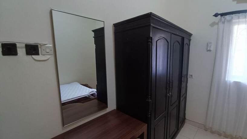 Imagen de la habitación del Hotel SPOT ON 93376 Roemah Ambarrukma 185 Syariah. Foto 16