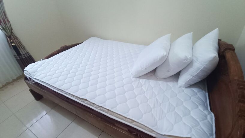 Imagen de la habitación del Hotel SPOT ON 93376 Roemah Ambarrukma 185 Syariah. Foto 20
