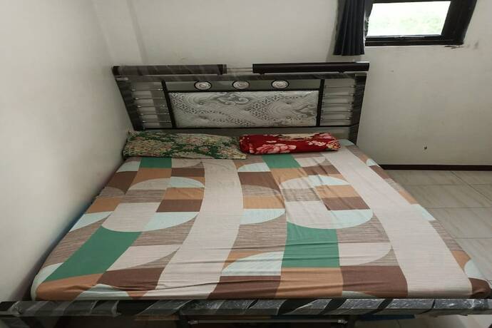 Imagen de la habitación del Hotel SPOT ON 93385 Penginapan Hj Lilis 2 Syariah. Foto 17