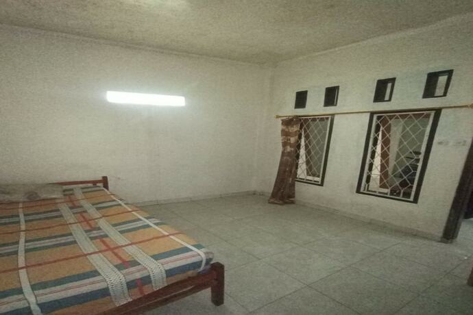 Imagen de la habitación del Hotel SPOT ON 93385 Penginapan Hj Lilis 2 Syariah. Foto 18