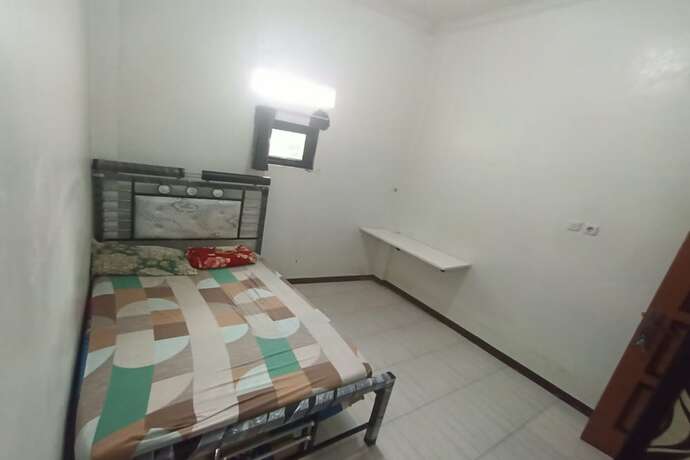 Imagen de la habitación del Hotel SPOT ON 93385 Penginapan Hj Lilis 2 Syariah. Foto 19