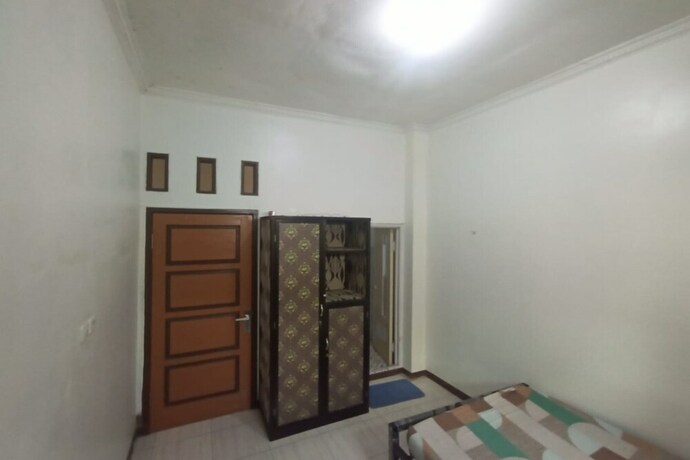 Imagen de la habitación del Hotel SPOT ON 93385 Penginapan Hj Lilis 2 Syariah. Foto 20