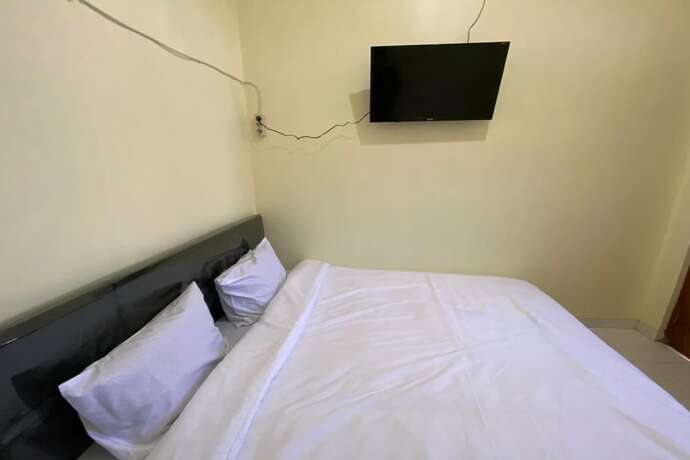 Imagen de la habitación del Hotel SPOT ON 93452 Wulan Homestay 2 Syariah. Foto 15