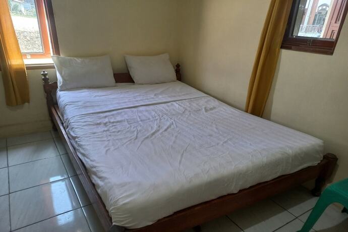 Imagen de la habitación del Hotel SPOT ON 93542 Suripah Kostel Syariah. Foto 17