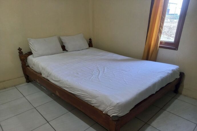 Imagen de la habitación del Hotel SPOT ON 93542 Suripah Kostel Syariah. Foto 20