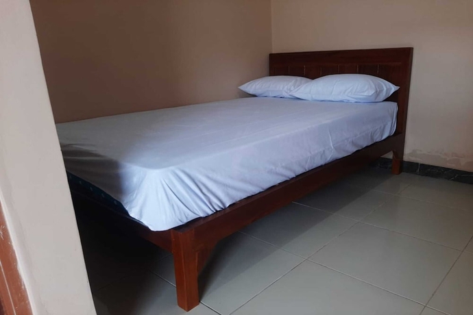 Imagen de la habitación del Hotel SPOT ON 93597 Syagita Kos and Penginapan Syariah. Foto 8