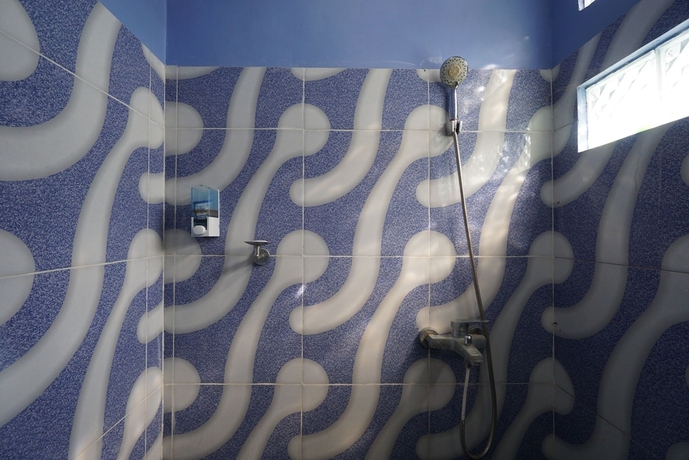 Imagen de la habitación del Hotel SPOT ON 93620 Anisa Homestay Syariah. Foto 11