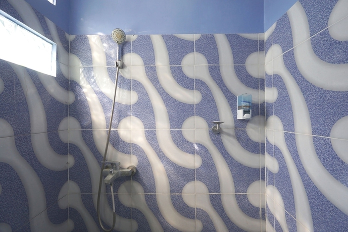 Imagen de la habitación del Hotel SPOT ON 93620 Anisa Homestay Syariah. Foto 12