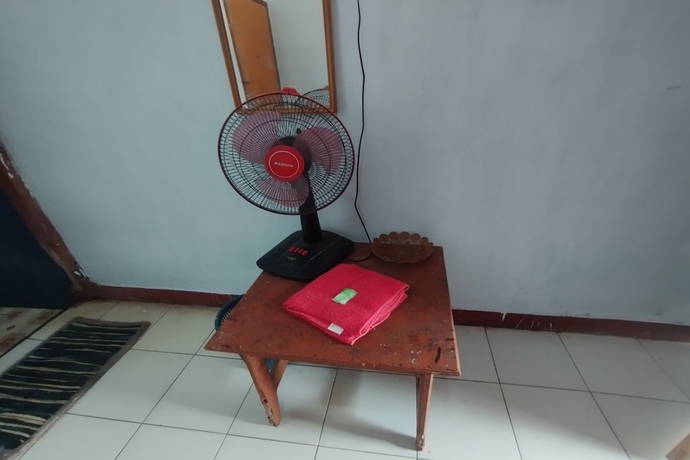 Imagen de la habitación del Hotel SPOT ON 93640 Dannis Homestay. Foto 4