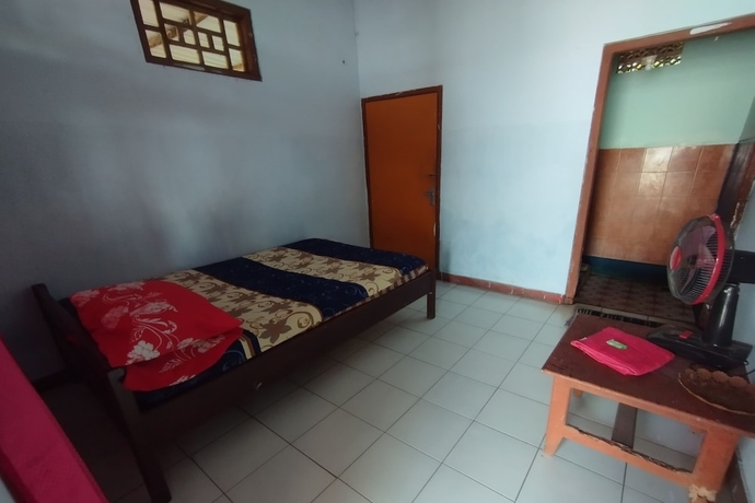 Imagen de la habitación del Hotel SPOT ON 93640 Dannis Homestay. Foto 7
