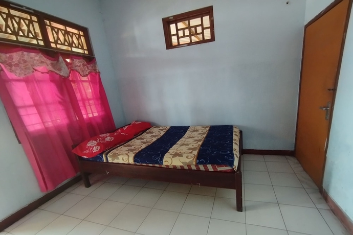 Imagen de la habitación del Hotel SPOT ON 93640 Dannis Homestay. Foto 8