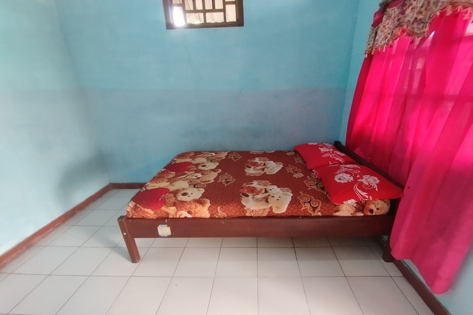 Imagen de la habitación del Hotel SPOT ON 93640 Dannis Homestay. Foto 12