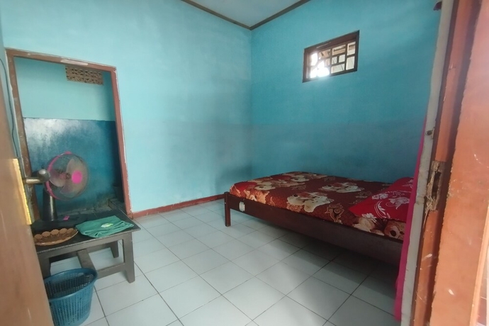 Imagen de la habitación del Hotel SPOT ON 93640 Dannis Homestay. Foto 14