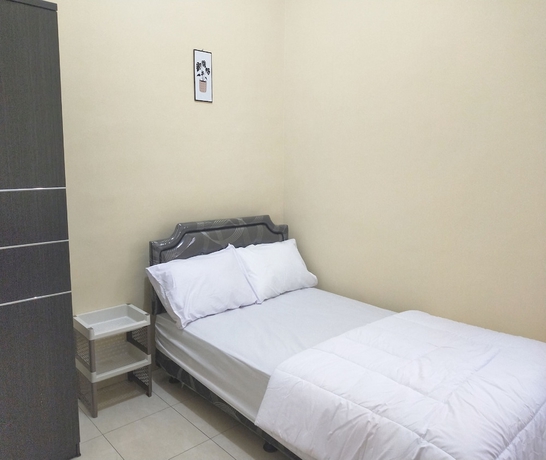 Imagen de la habitación del Hotel SPOT ON 93651 Losmen Ida. Foto 2