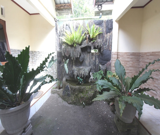 Imagen de los interiores del Hotel SPOT ON 93651 Losmen Ida. Foto 10