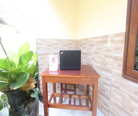 Imagen de los interiores del Hotel SPOT ON 93651 Losmen Ida. Foto 19