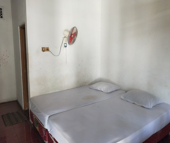 Imagen de la habitación del Hotel SPOT ON 93651 Losmen Ida. Foto 4