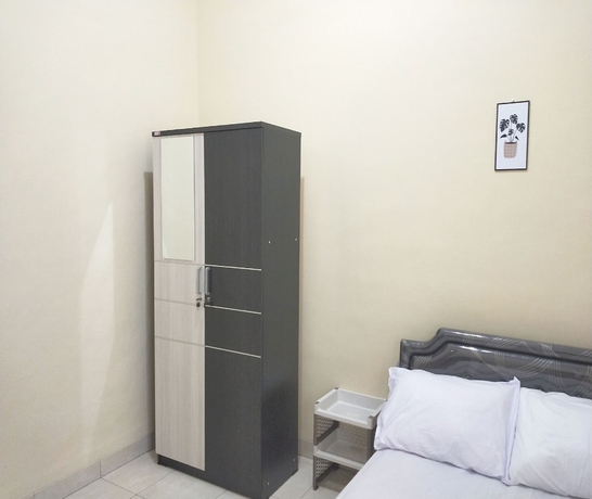 Imagen de la habitación del Hotel SPOT ON 93651 Losmen Ida. Foto 5