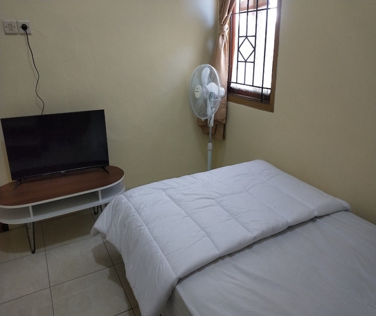 Imagen de la habitación del Hotel SPOT ON 93651 Losmen Ida. Foto 6