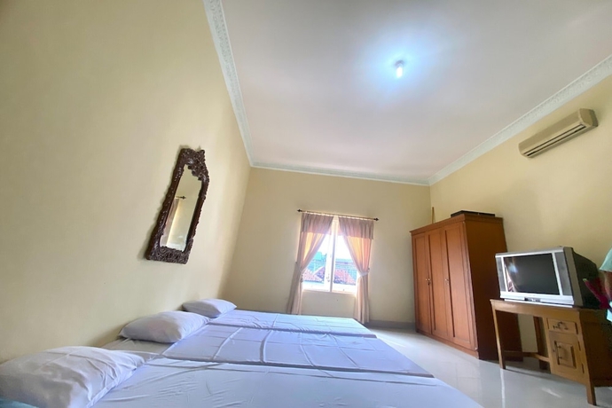 Imagen de la habitación del Hotel SPOT ON 93711 Kenzie Bunkbed Syariah. Foto 2