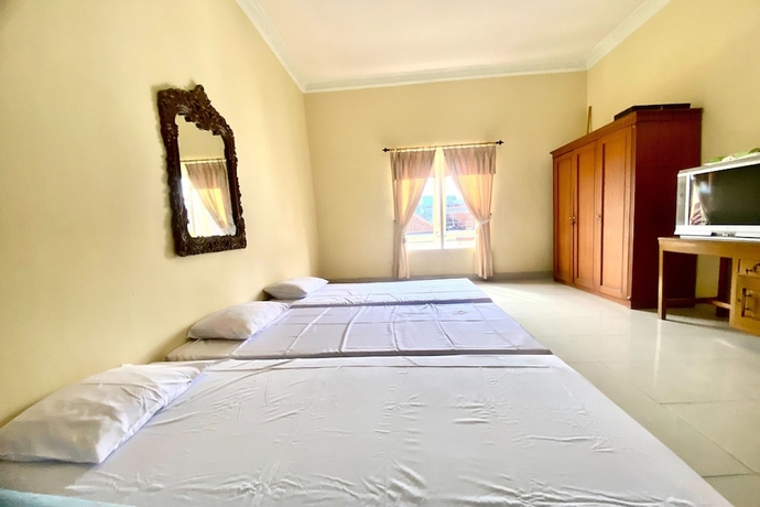 Imagen de la habitación del Hotel SPOT ON 93711 Kenzie Bunkbed Syariah. Foto 3