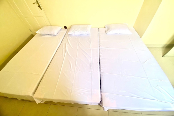 Imagen de la habitación del Hotel SPOT ON 93711 Kenzie Bunkbed Syariah. Foto 5