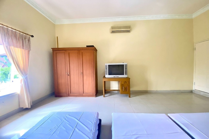 Imagen de la habitación del Hotel SPOT ON 93711 Kenzie Bunkbed Syariah. Foto 6