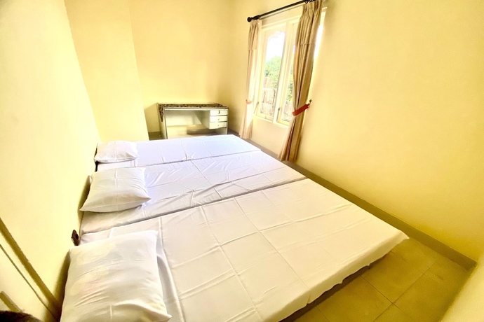 Imagen de la habitación del Hotel SPOT ON 93711 Kenzie Bunkbed Syariah. Foto 8