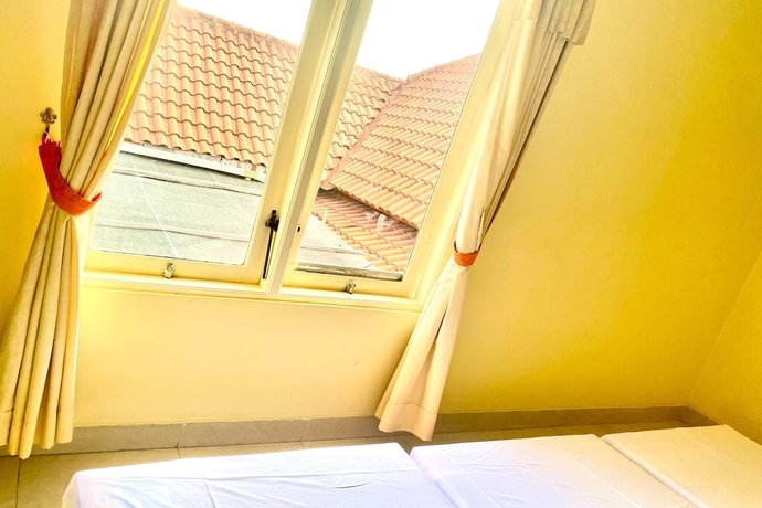 Imagen de la habitación del Hotel SPOT ON 93711 Kenzie Bunkbed Syariah. Foto 9